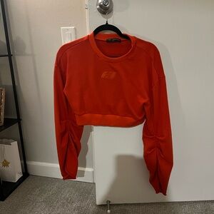 orange long sleeve crop top. worn once.